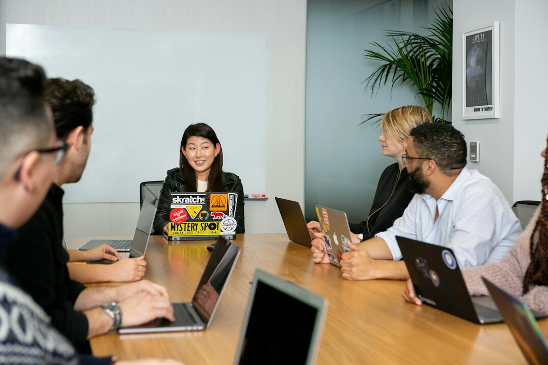 woman leading team meeting